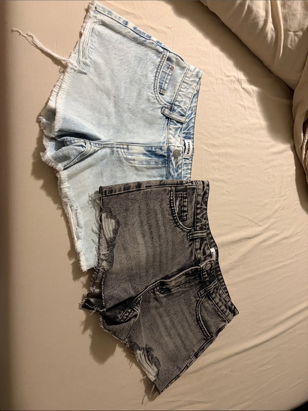 RSQ Two-Pack High-Rise Cutoff Denim Shorts in Light Blue & Black Wash